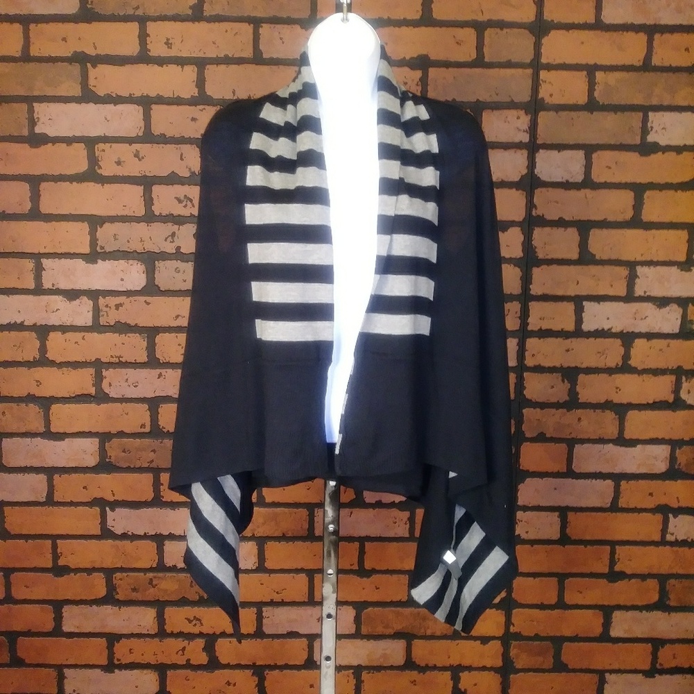 Black and grey sleeveless asymmetrical vest